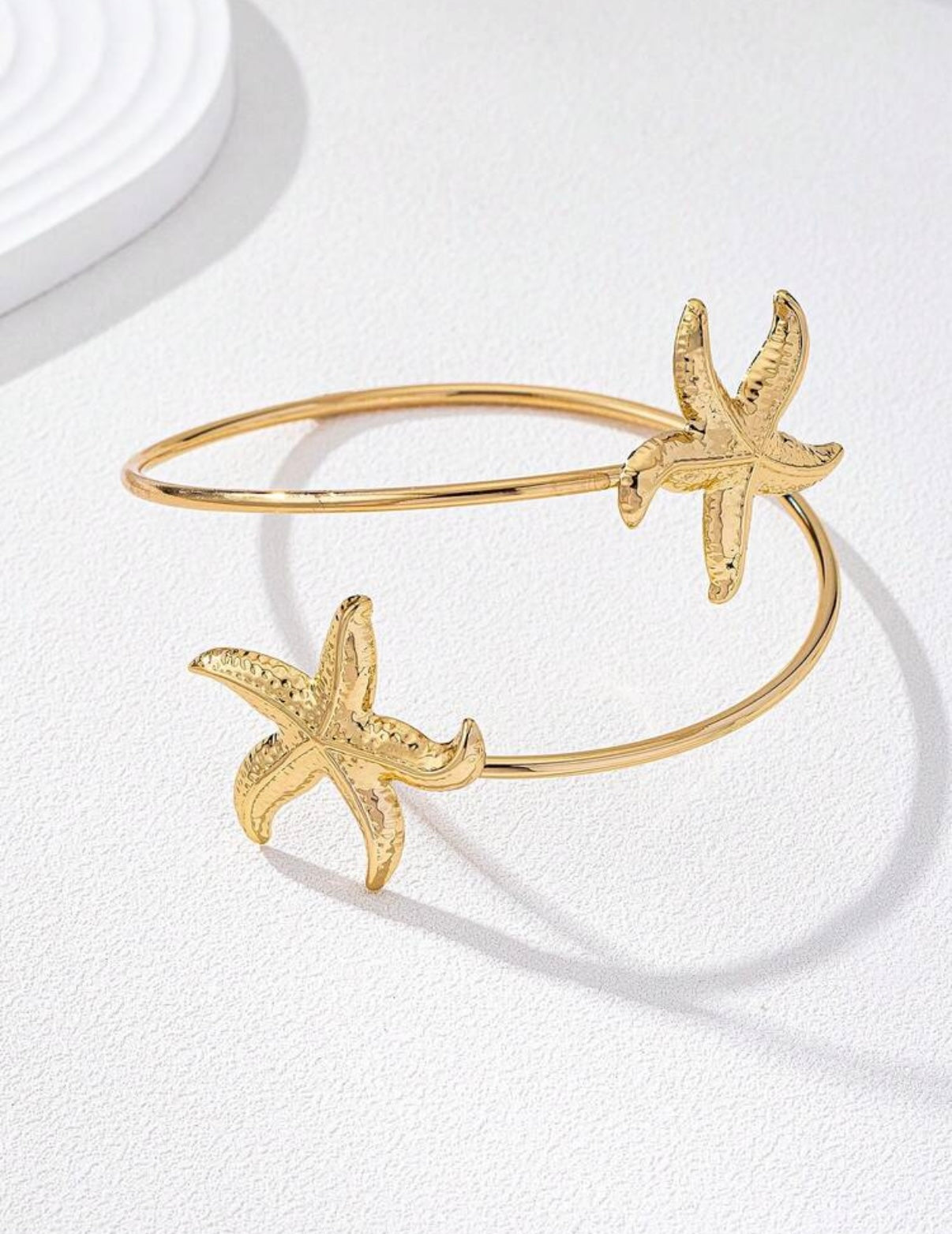 Brazalete con diseño de estrella de mar